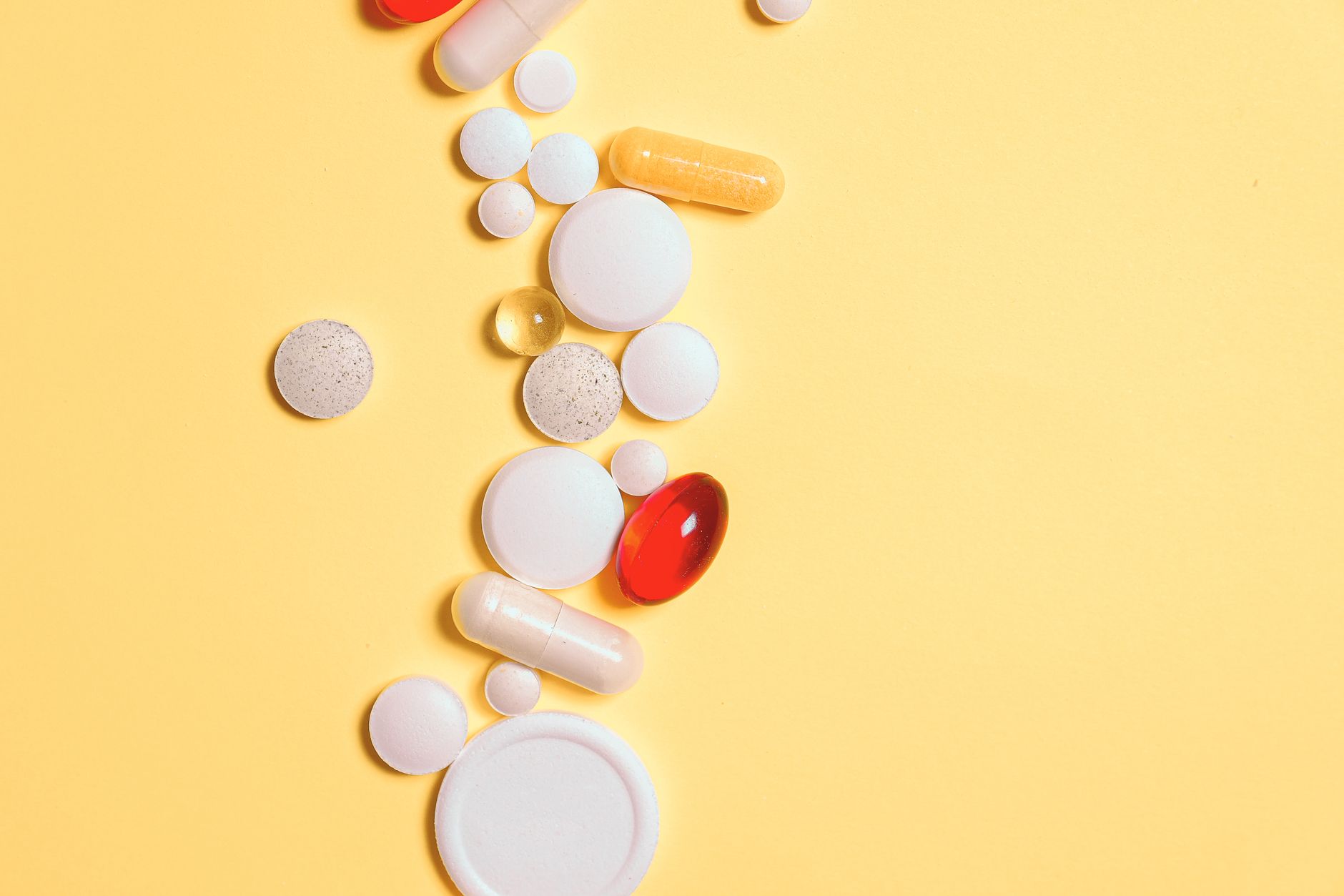 Assorted supplement capsules and vitamin pills