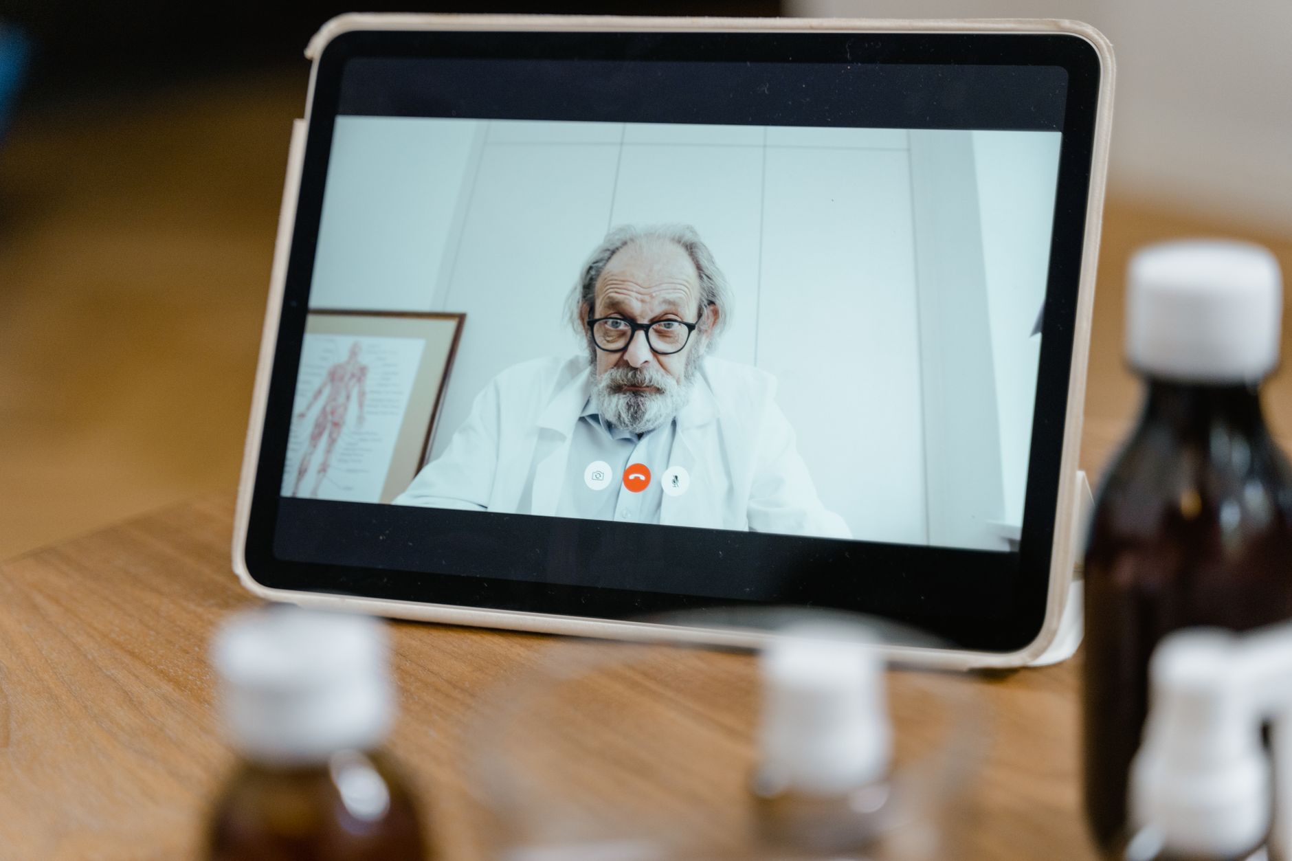 Telehealth doctor on a video call reviewing a GLP-1 weight loss consultation