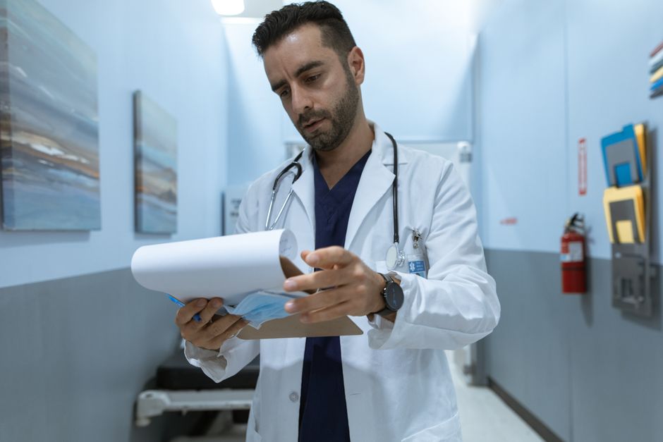 How Often Should You Get Blood Work? - doctor reviewing lab results