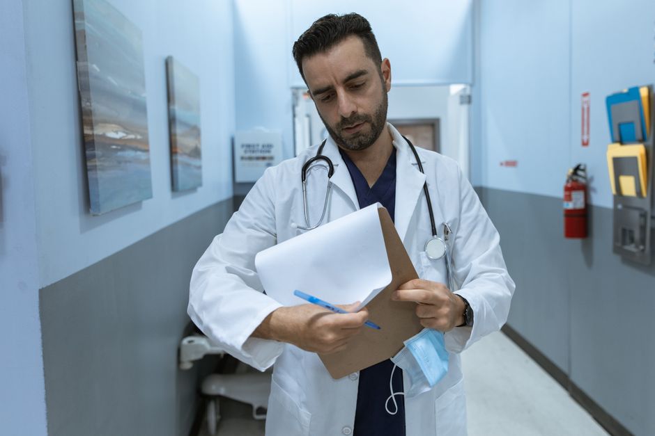 Low ALT in a Blood Test: What It Means and When to Worry - doctor reviewing lab results