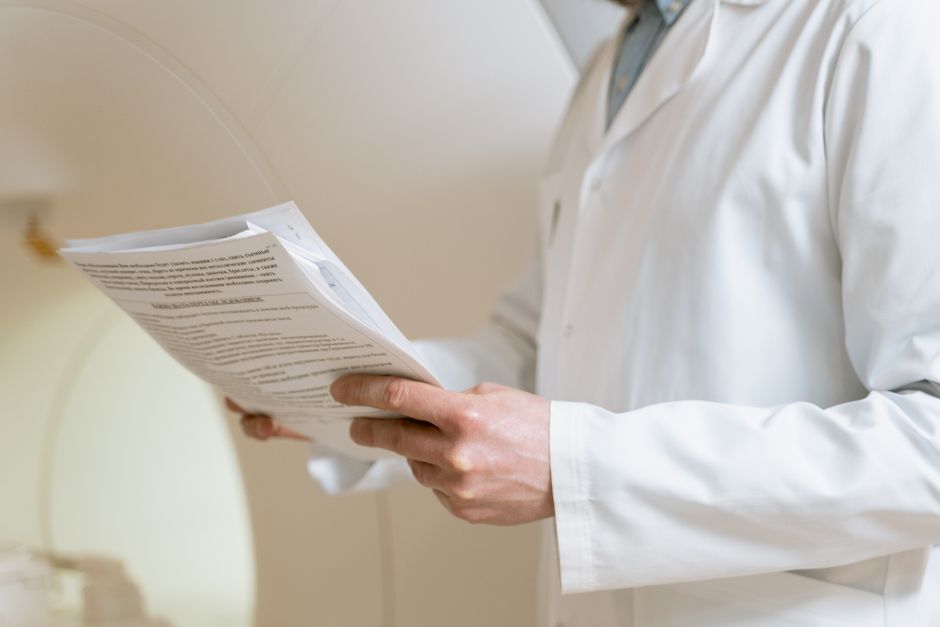 What Are High Lymphocytes in a Blood Test? What a High Count Really Me - doctor reviewing lab results