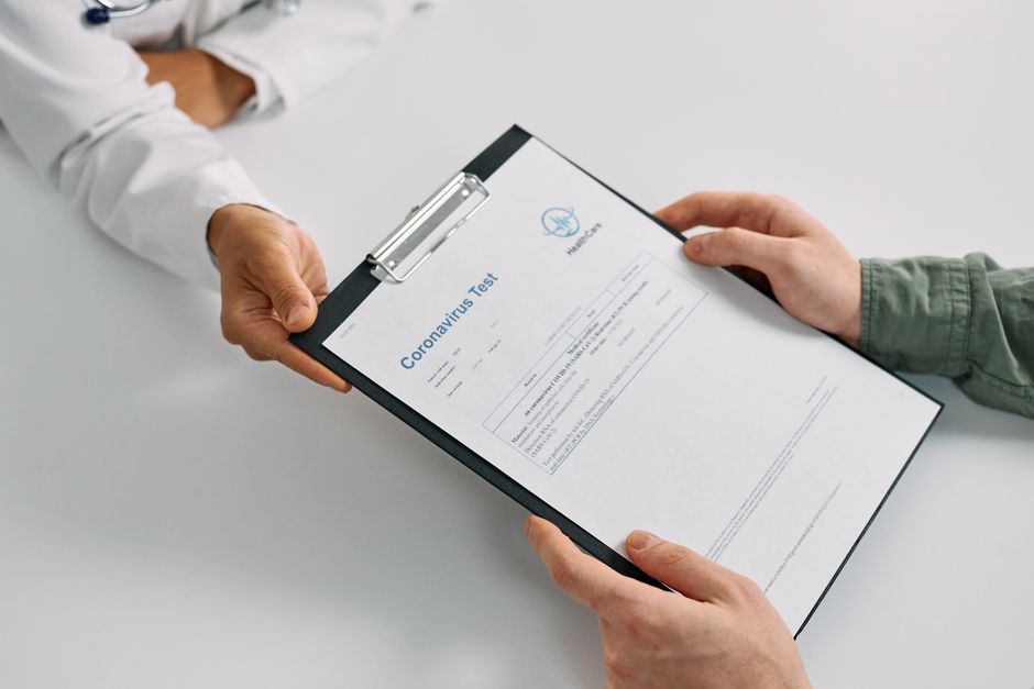 What Does High Monocytes in a Blood Test Mean? Causes and When to Worr - doctor reviewing lab results