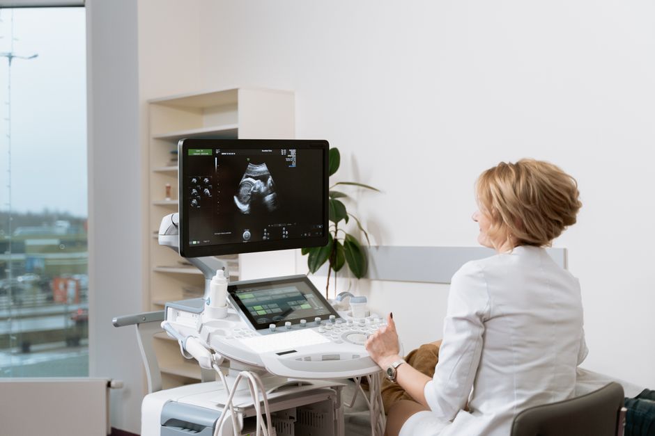 What Does Low Uric Acid in a Blood Test Mean? - doctor reviewing scan
