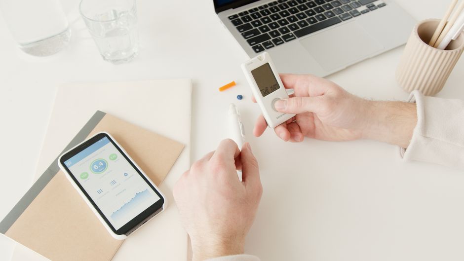 Function Health Refund and Cancellation Policy: What You Lose - person using laptop health app