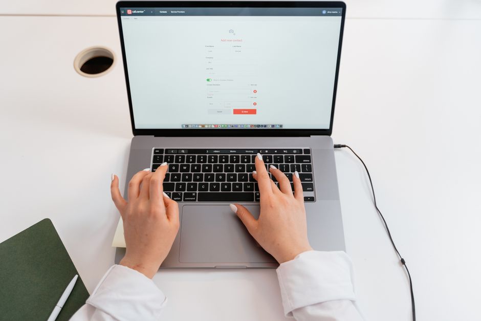 Function Health Add-On Test Prices: Full 2026 Cost List - person using laptop health app