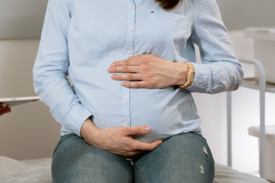 What Is an hCG Blood Test? Levels by Week and How to Read Your Results - pregnant woman doctor